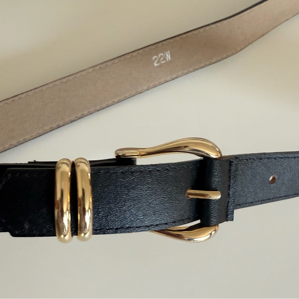 Black belt, golden color buckle
